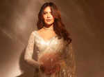 Esha Gupta looks dreamy in a silver sequined saree