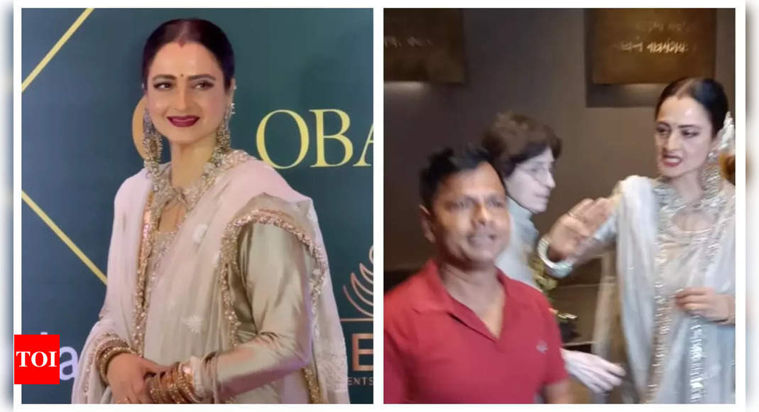 Rekha playfully slaps a man at an event after posing with him; fans REACT – WATCH video | Hindi Movie News