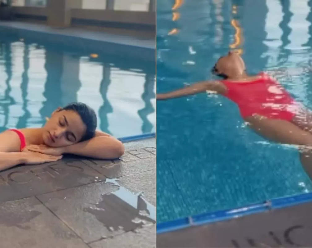 
VIRAL video ALERT! Alia Bhatt dons PINK monokini, chills in pool, captions it 'My schedule on my day off...'
