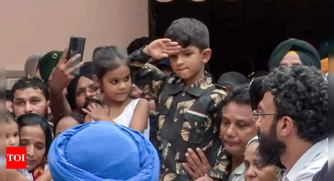 A heartwrenching final salute: 6-year-old son bids goodbye to braveheart killed in Kashmir | India News