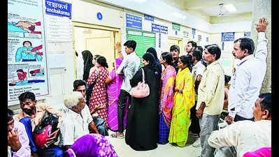 Small OPD building forces patients to sit, wait under tin shed