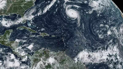 Hurricane Nigel strengthens, gaining Category 2 status far from land out in the Atlantic