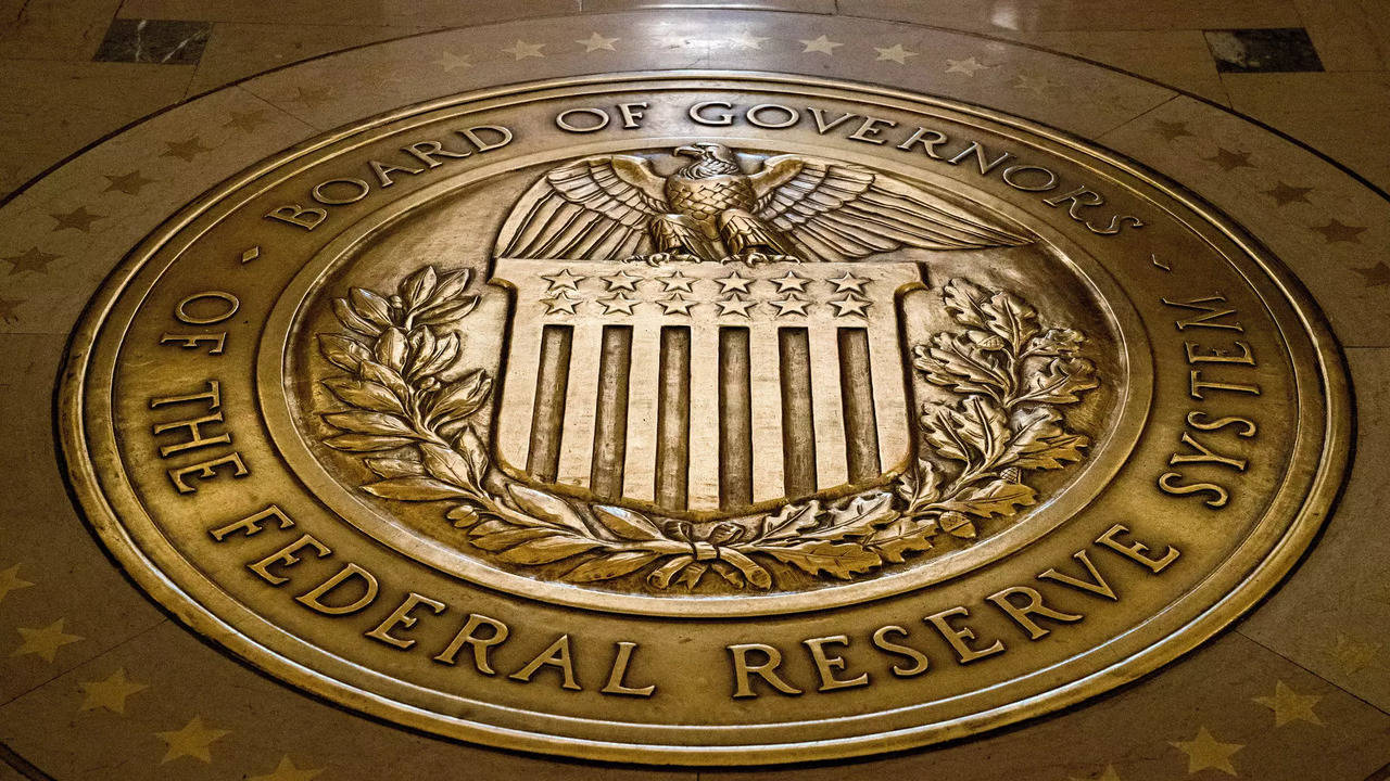 US Federal Reserve leaves key interest rate unchanged, sees hike by  year-end - Times of India