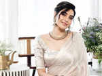 Karishma Tanna defines elegance and grace in an ivory white silk saree