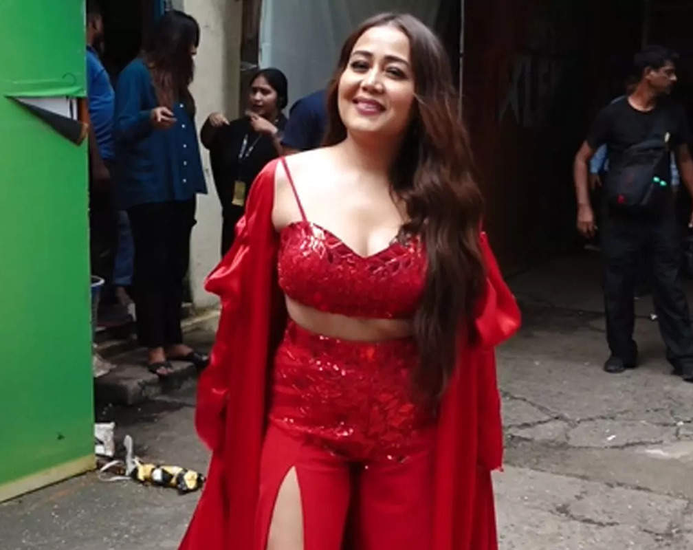
Neha Kakkar radiates glamour in red outfit as she gets clicked on sets of a TV show
