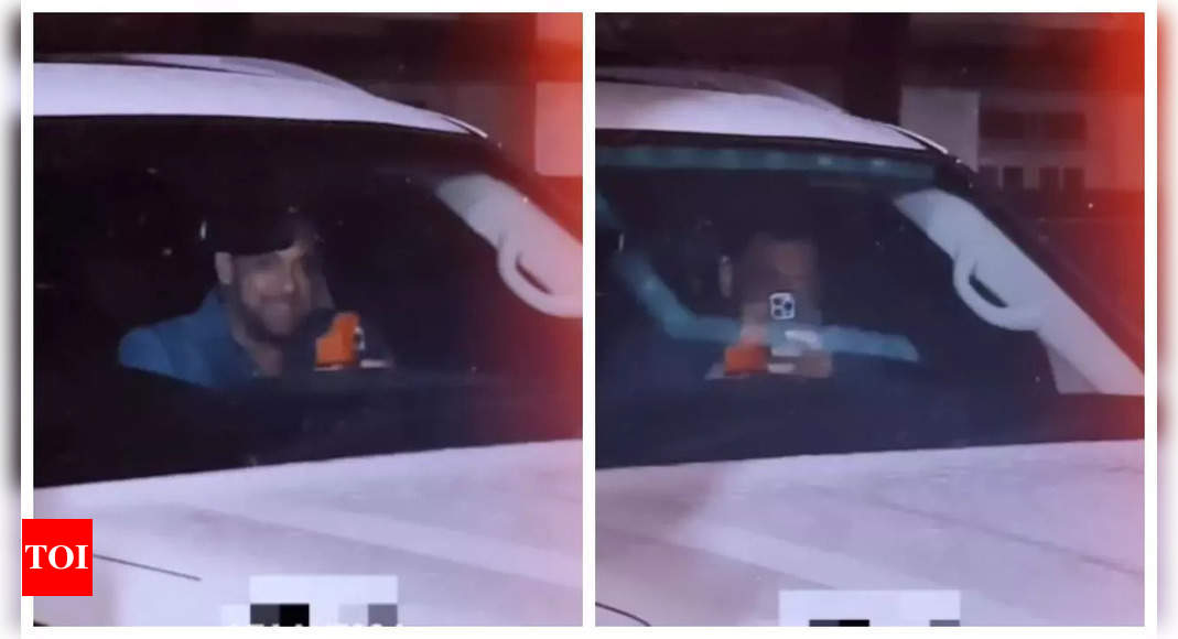 Salman Khan playfully takes photos of paparazzi from his car as they ...