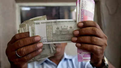 Rupee may open near record lows pressured by oil prices, US yields