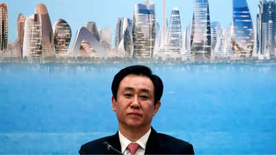 Police hold boss of troubled developer China Evergrande
