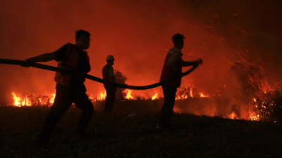 Fires on Indonesia's Sumatra island cause smoky haze, prompting calls for people to work from home