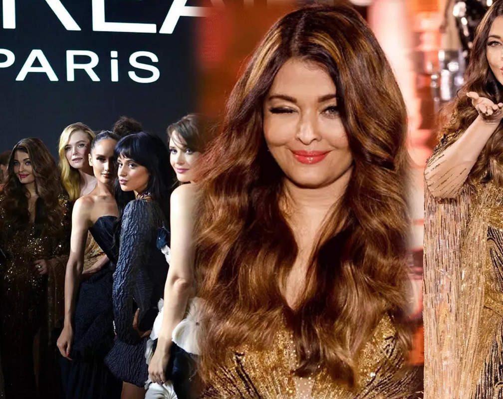 
Aishwarya Rai Bachchan winks, blows flying kisses as she walks the ramp at Paris Fashion Week, strikes pose with Kendall Jenner, Eva Longoria, and others
