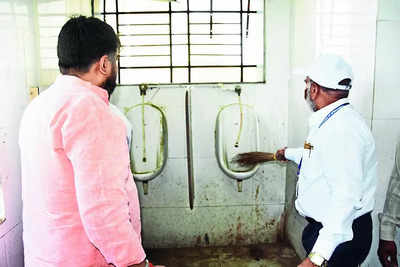 Shiv Sena MP who made dean clean toilets booked