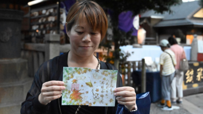 In secular Japan, what draws so many to temples and shrines? Stamp collecting and tradition