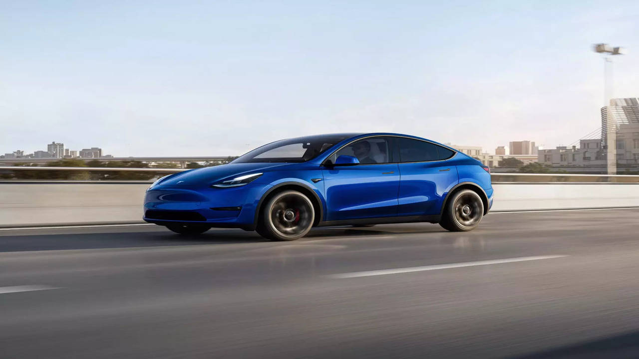 Tesla: Tesla slashes prices of Model 3, Models Y vehicles in US - Times of  India