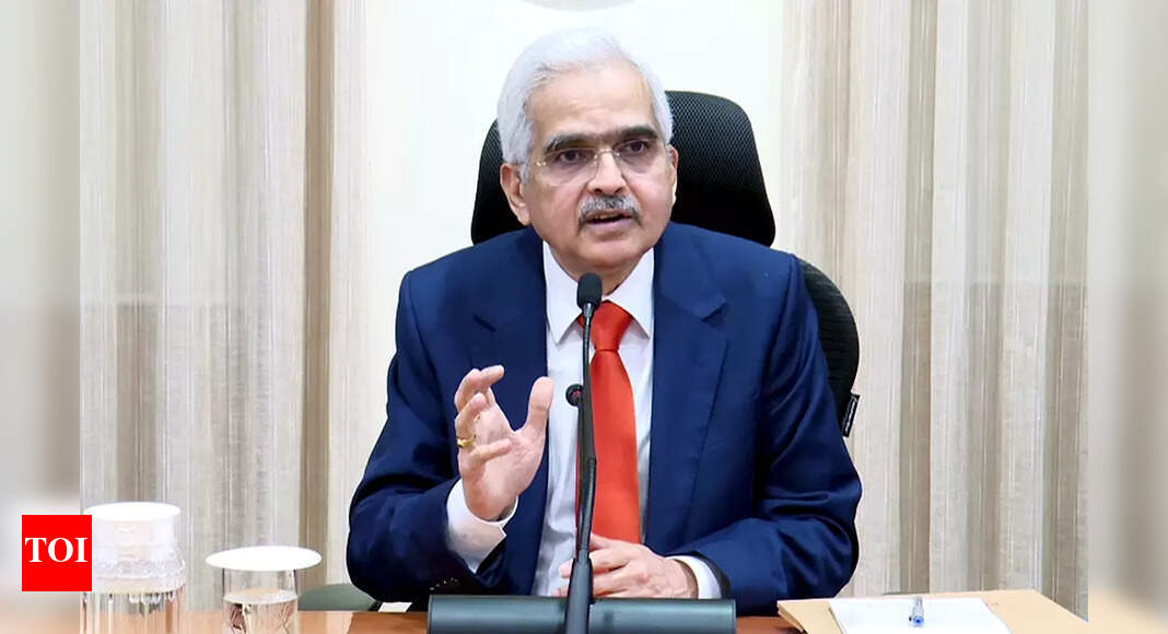 RBI strikes hawkish tone with surprise bond plan - Times of India