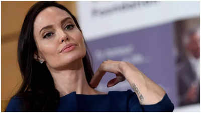 Angelina Jolie's Cut-Out Maxi Dress Is the Ultimate Transition Piece