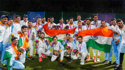 Gold for men's cricket team via 'rain rule'