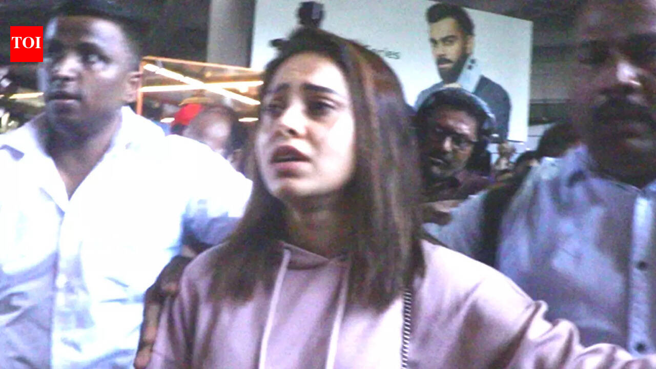 Nushrratt Bharuccha looks visibly 'distraught' as she returns to Mumbai ...