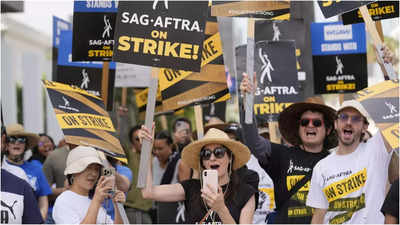 Hollywood writers approve new contract, end five-month strike