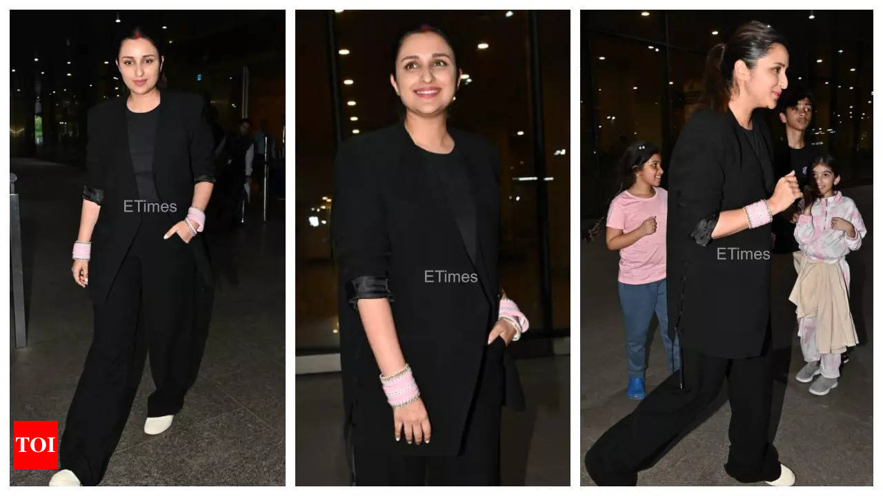 Parineeti Chopra is oh-so-pretty in a hot pink pantsuit at Mumbai Airport.  See pics - India Today
