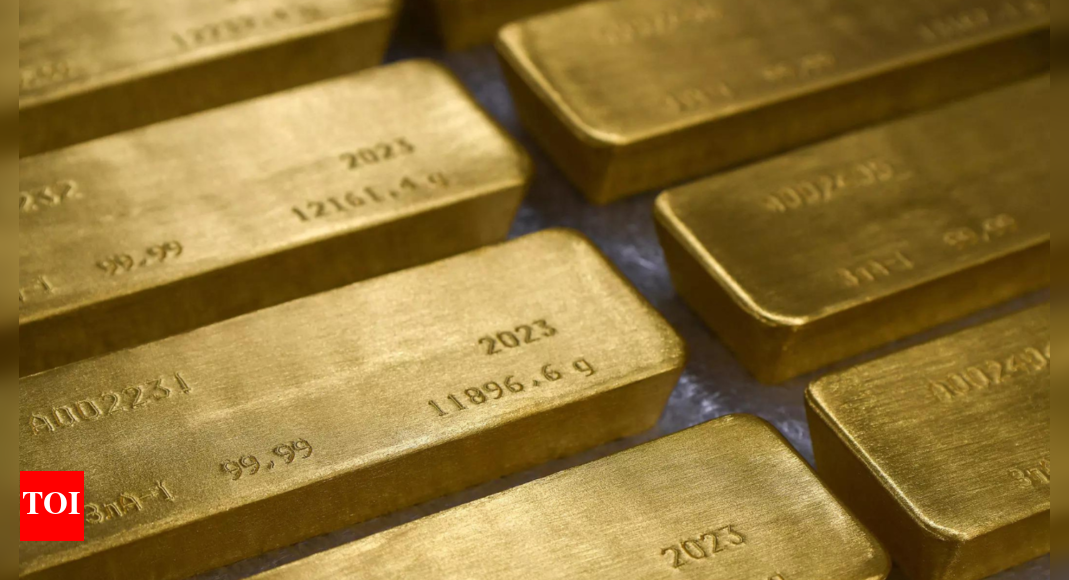 Fed: Gold steady as Fed officials adopt dovish policy tone - Times of India
