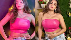 Monalisa poses in a pink tube top paired with blue denims