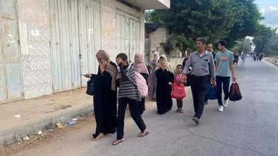 Israel's military orders civilians to evacuate Gaza City, ahead of a feared ground offensive