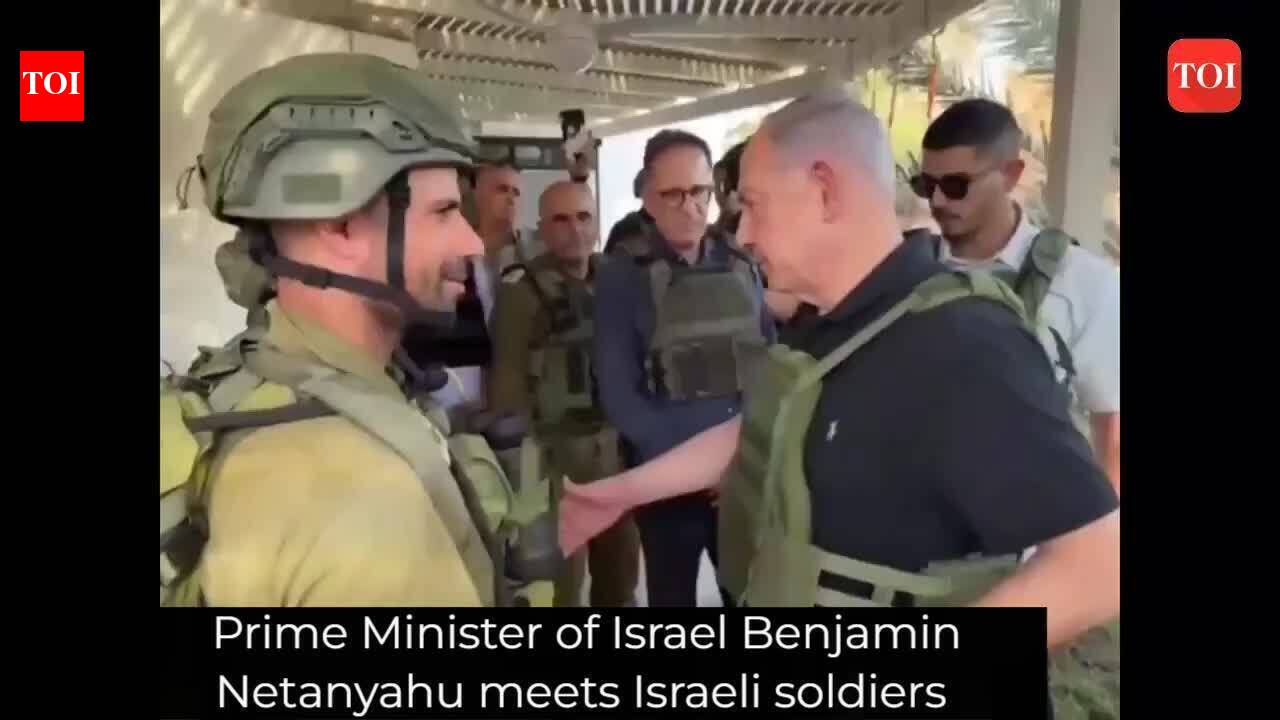 Israel PM Benjamin Netanyahu meets Israeli soldiers at the front