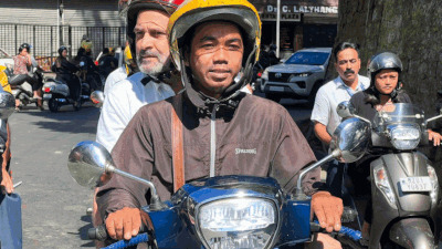 Rahul Gandhi rides pillion on scooter to meet former Mizoram CM