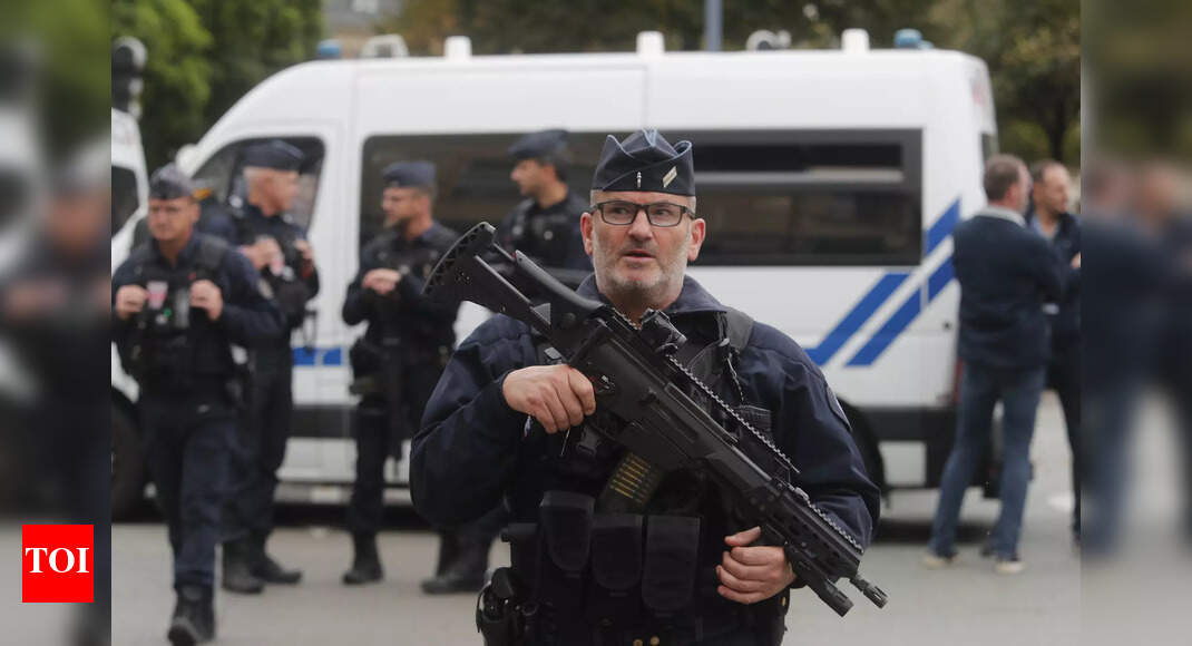 Suspect in killing of French teacher put under formal investigation