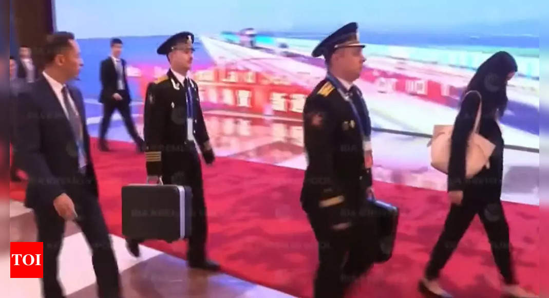 Putin Filmed In China Accompanied By Officers With Russian Nuclear Briefcase Times Of India 8762