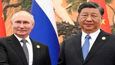 With Putin by his side, Xi talks of a new world order