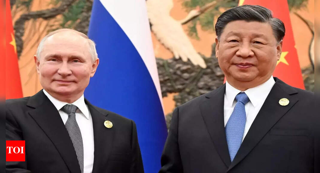 With Putin by his side, Xi talks of a new world order