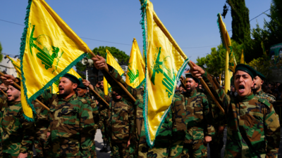 Hezbollah and Israel exchange fire and warnings of a widened war
