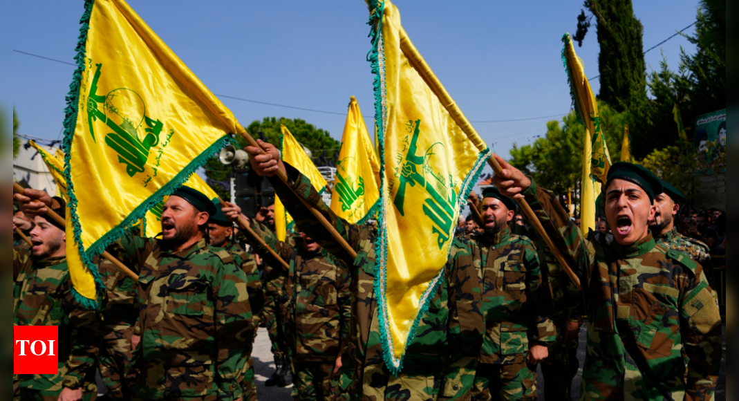 Hezbollah and Israel exchange fire and warnings of a widened war