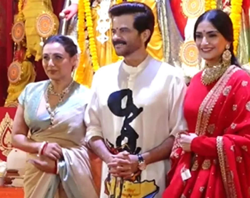 
Sonam Kapoor is all smiles as she poses with Anil Kapoor and Rani Mukerji at Durga Puja pandal

