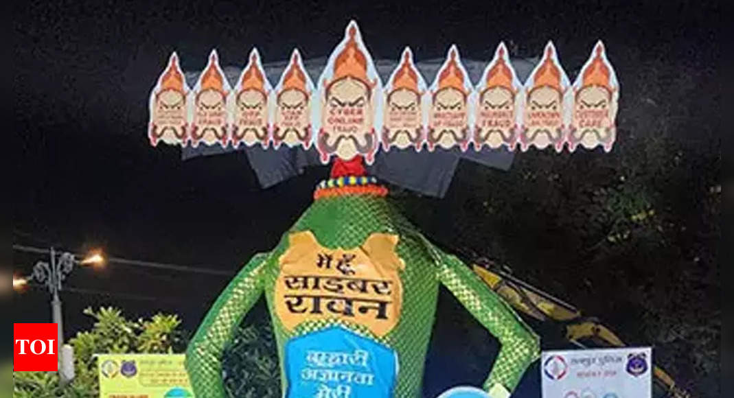 Watch: Raipur Police’s Cyber Ravan effigy to spread awareness about various OTP, mobile banking and other online frauds – Times of India