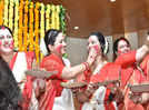 Women perform traditional Sindoor Khela and celebrate the festival