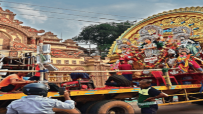 Twin cities bid emotional farewell to Durga