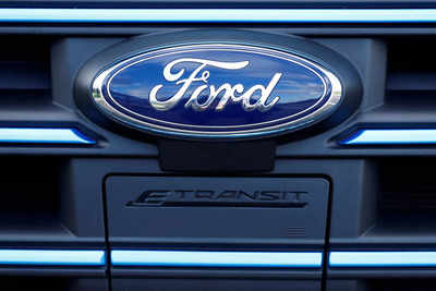 Ford shares fall after pulling full-year forecast, wider EV losses - Times  of India