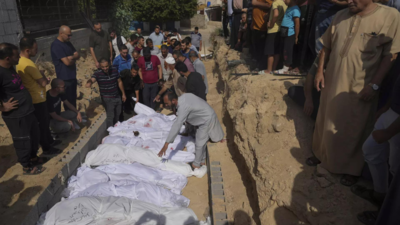 Israel-Hamas war: Mass graves & a city in Gaza robbed of funeral rites