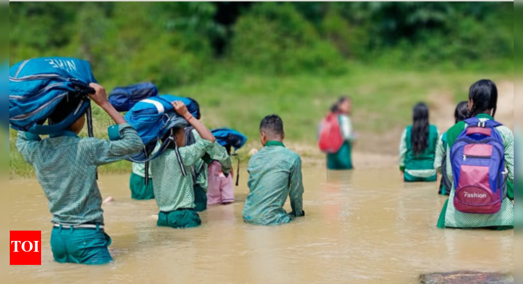 School a daily trial by water for these kids | India News - Times of India