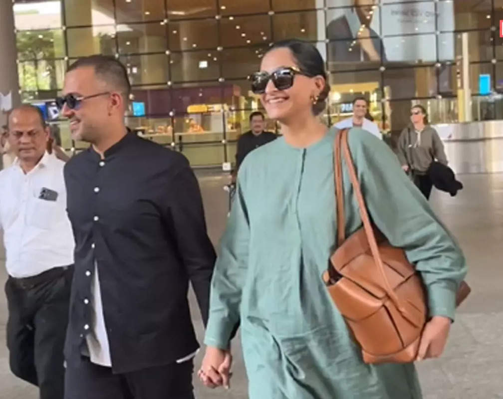 
Couple goals! Sonam Kapoor and Anand Ahuja walk hand-in-hand at airport
