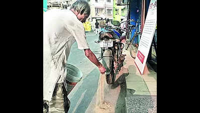 Organizers plant saplings, fill up holes to restore roads after puja