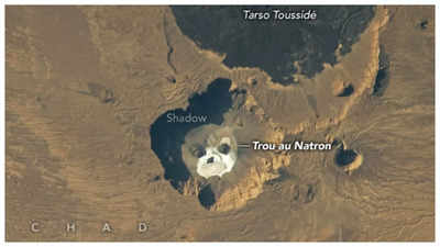 A ghostly face in the rock: Nasa releases eerie image of 'skull' in a volcanic pit in Sahara