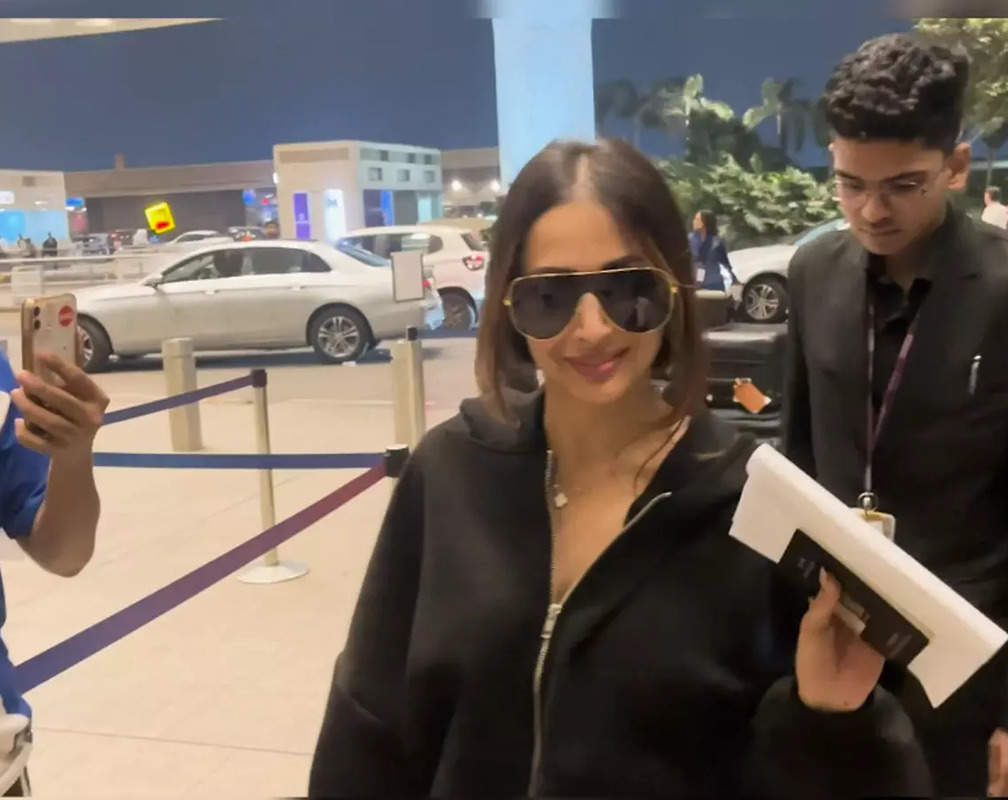 
Malaika Arora amps up the airport look in all BLACK ensemble, briefly poses for the paparazzi
