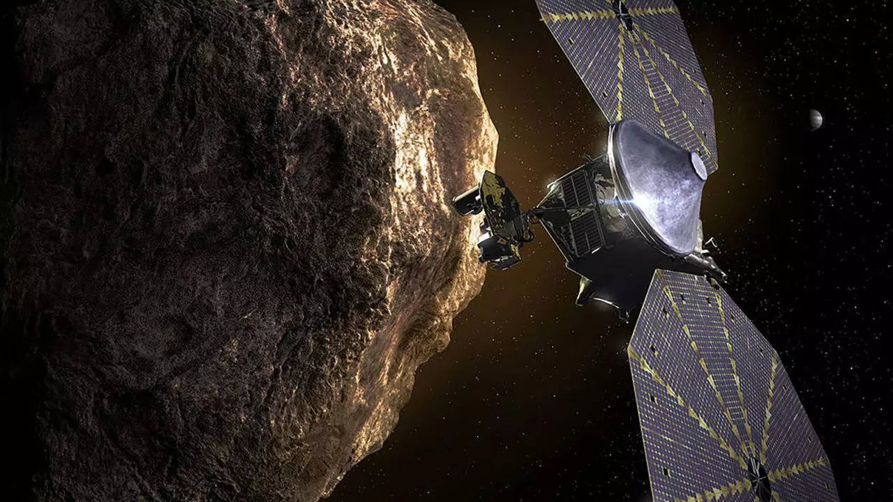 Lucy: Nasa's Lucy spacecraft navigates historic flyby of asteroid 'Dinky' -  Times of India