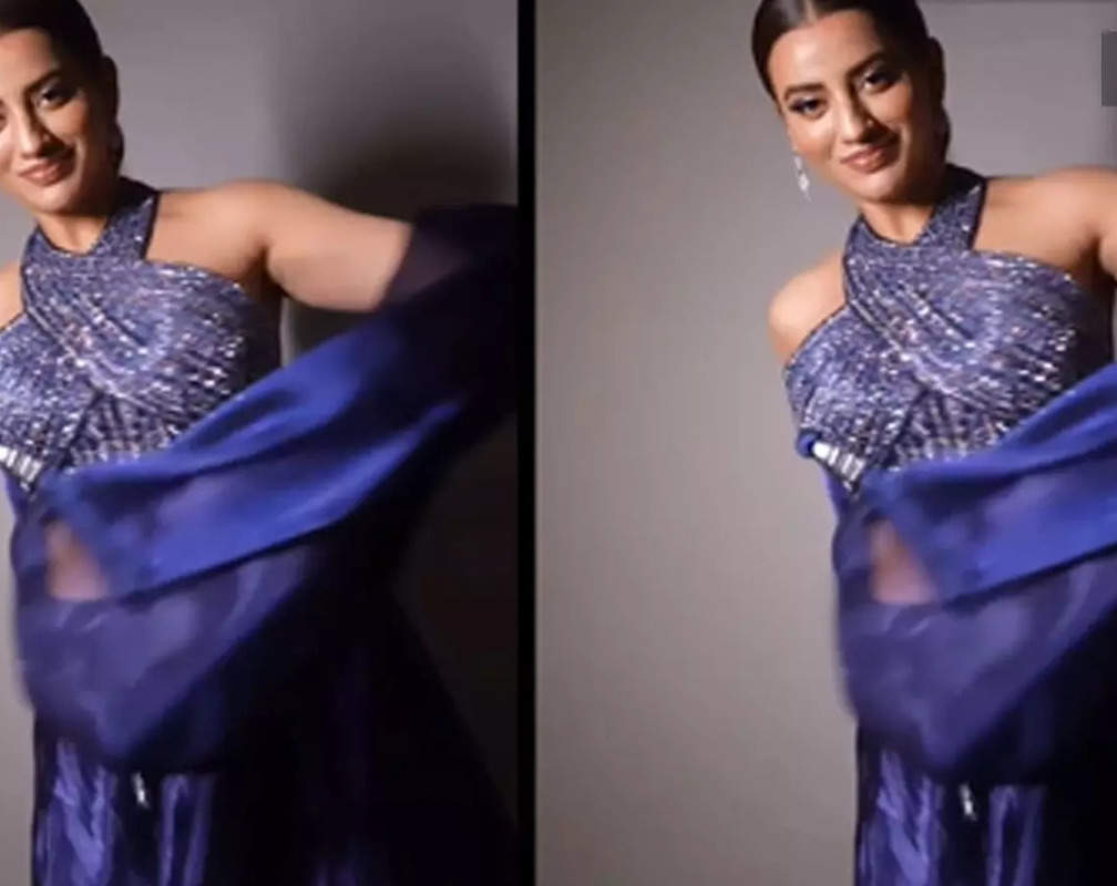 
Akshara Singh poses in a shimmery blue dress; says 'Wow to myself'
