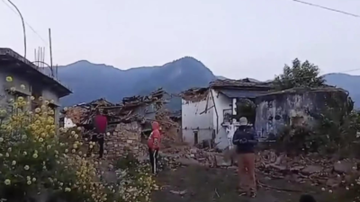 Nepal scrambles to rescue survivors of a quake that shook its northwest and killed at least 128