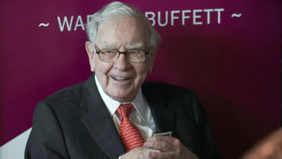 Warren Buffett's firm reports $12.8 billion loss as investments fall but its insurers performed well
