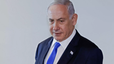 Netanyahu fights for political survival to beat of war drums